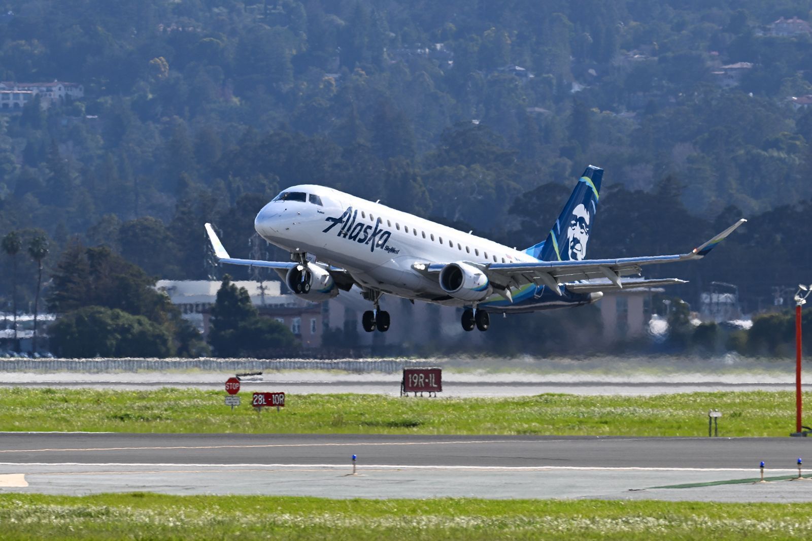 Alaska Airlines passenger accused of trying to open cockpit door has been charged in federal court